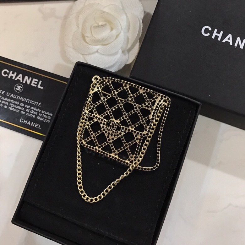 Ch*el brooches